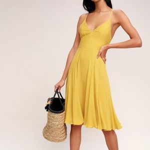 Yellow lace up midi dress